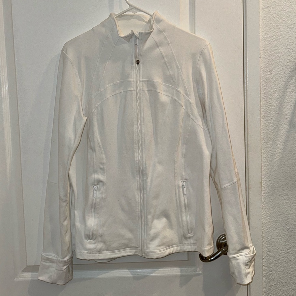 White and black lululemon zip up jacket